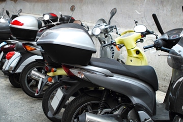 italian street with parked motorcycles