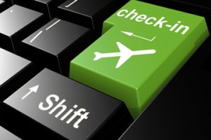 online check in flight on green keyboard